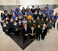 Photo of Penny Williams with a group of women and girls