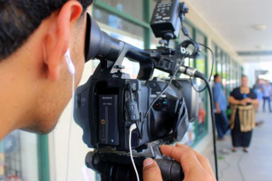 Camera operator filming