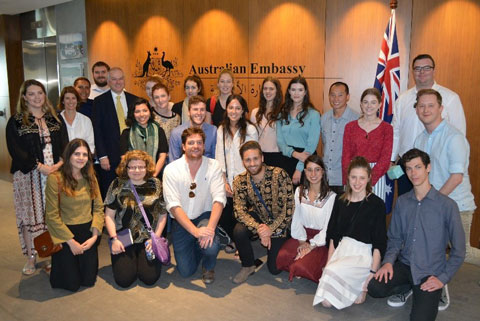 Group of people posing for a photo at the Australian Emabassy in Doha.