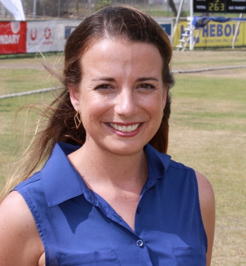 Jane Livesey, headshot, cricket field in background
