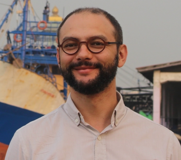 Tarek Ketelsen, headshot, large ships in background