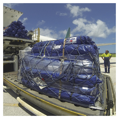 Australian emergency supplies arriving in Tonga following Cyclone Ian, Nuku’alofa, January 2014. [DFAT/Scott McLennan]