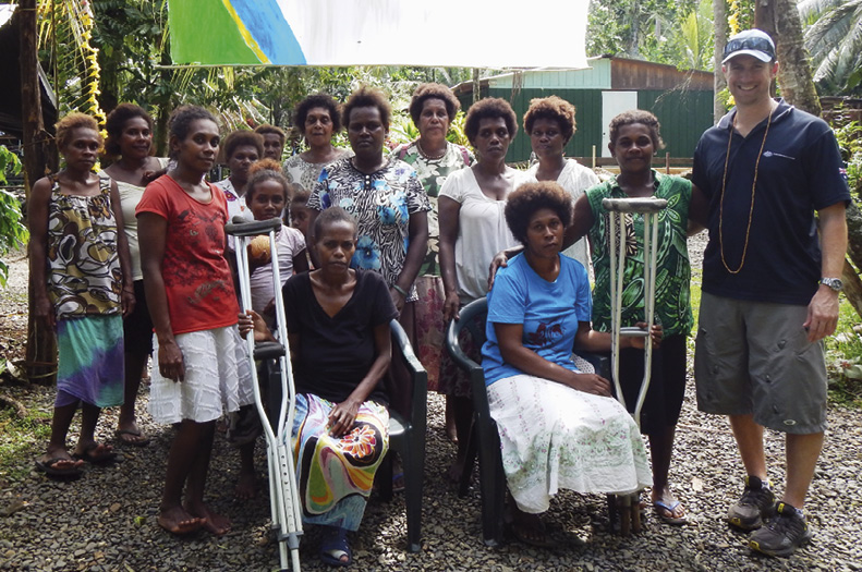 Second Secretary Honiara, Ben O’Reilly, with women from a High Commission-funded community sewing project, Niu Areata, Solomon Islands, 22 March 2014. [DFAT]