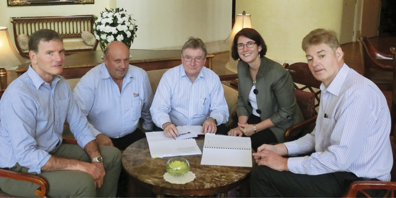 First Assistant Secretary Office of Trade Negotiations, Chris De Cure OAM (centre), and Assistant Secretary Elizabeth Ward (second right), with representatives from Australia’s beef, grains and sugar industries in the margins of a TPP negotiation round, Ho Chi Minh City, 14 May 2014