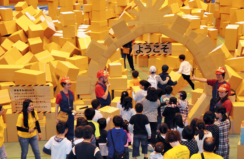 Officers from the embassy in Tokyo assist at the Polyglot theatre’s interactive production, We Built This City, Minami Sanriku, 2 November 2013. [DFAT]
