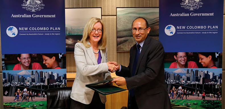 Secretary, Peter Varghese AO, and Secretary, Department of Education, Lisa Paul AO PSM, sign the New Colombo Plan Memorandum of Understanding, Canberra, 14 April 2014. [DFAT]