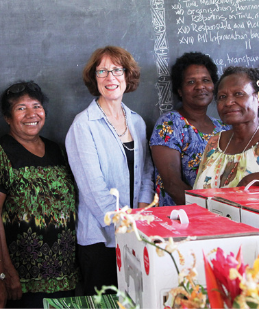 High Commissioner to Papua New Guinea, Deborah Stokes, hands over sewing machines to women in Manus—a High Commission-funded sewing project, 29 January 2014. [DFAT]