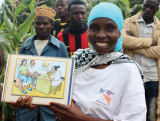 ANCP-supported community health worker, Zuhara Msesa, displays her training manual
