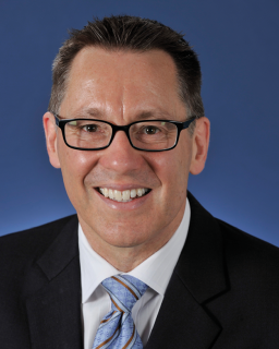 Former Parliamentary Secretary to the Minister for Foreign Affairs, the Hon. Dr Brett Mason