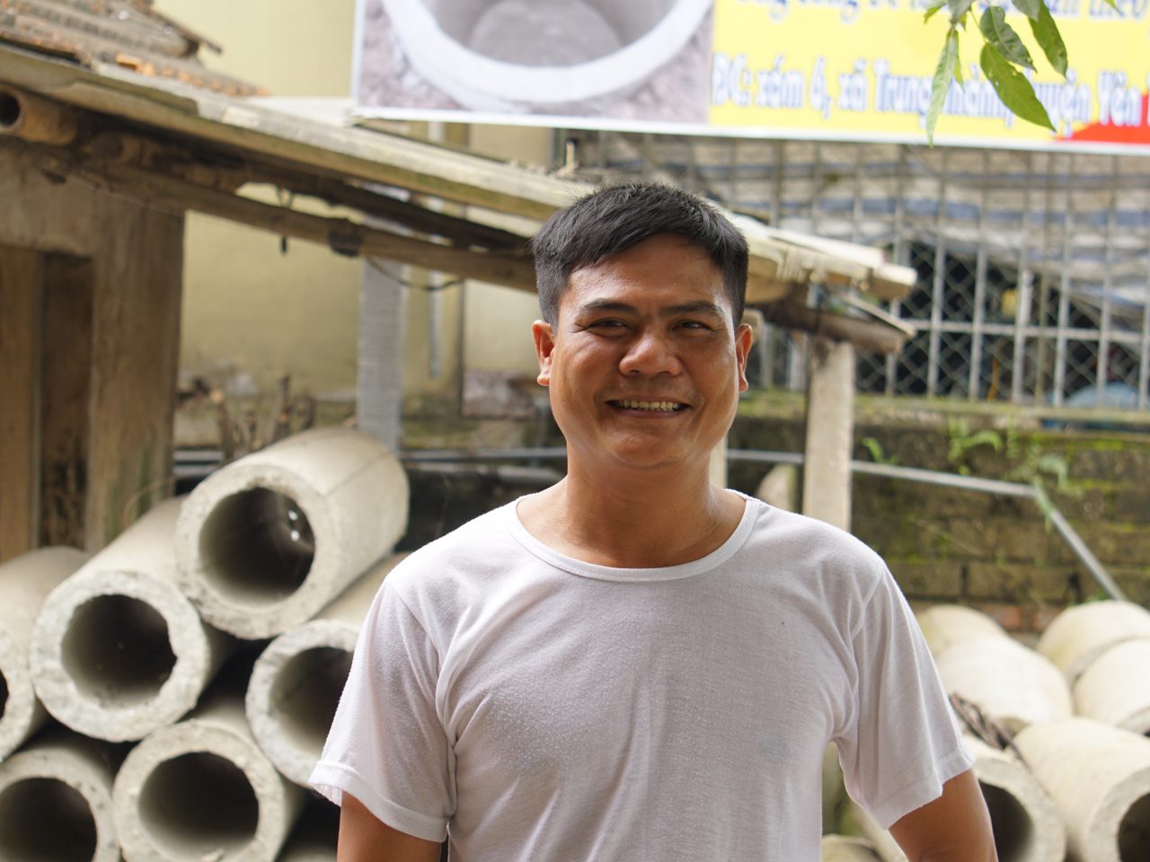 DFAT aid funding helped train Mr Nguyen, a concrete ring producer and mason in Vietnam. [INTERNATIONAL DEVELOPMENT ENTERPRISES/Quang V. Nguyen]