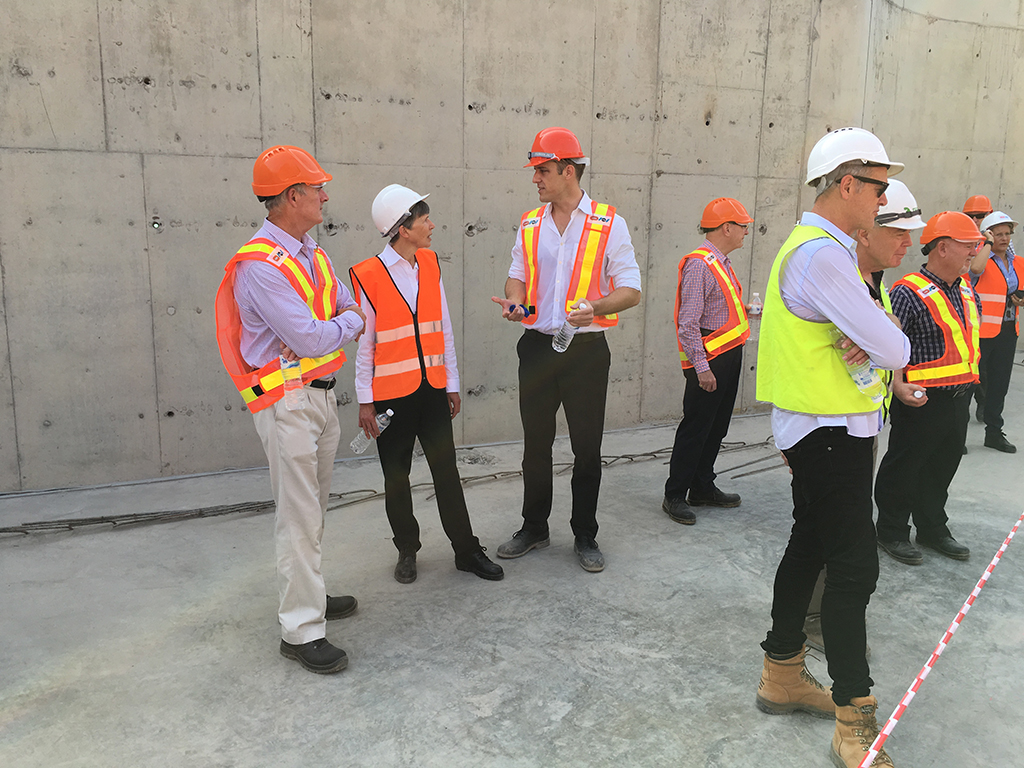 Deputy Secretary Jennifer Rawson and Executive Director Overseas Property Office and Services Kevin Nixon with Bangkok Project Control Group members inspecting the Bangkok embassy construction site. [GOLLINGS PHOTOGRAPHY/John Gollings]