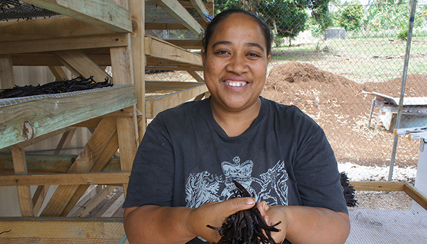 Female member of the Vanilla Growers Association in Tonga with cured vanilla pods for export. [FAIRTRADE ANZ/Rachel Levine]