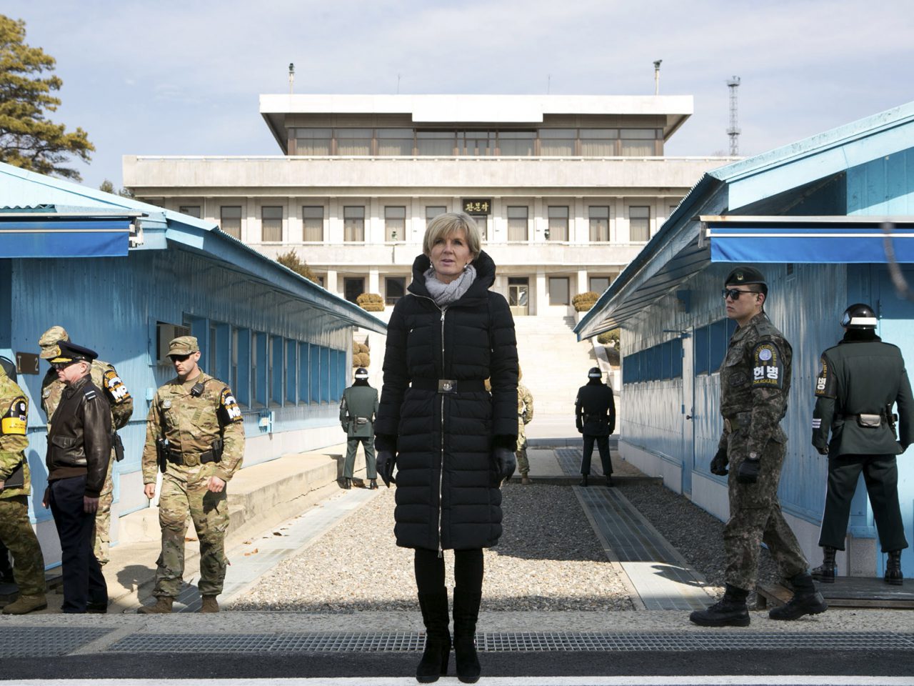 Minister for Foreign Affairs Julie Bishop at the Joint Security Area, Demilitarized Zone, Panmunjom, Republic of Korea, with soldiers from the United Nations Command guarding the Military Demarcation Line. [Lee Gang-gook]