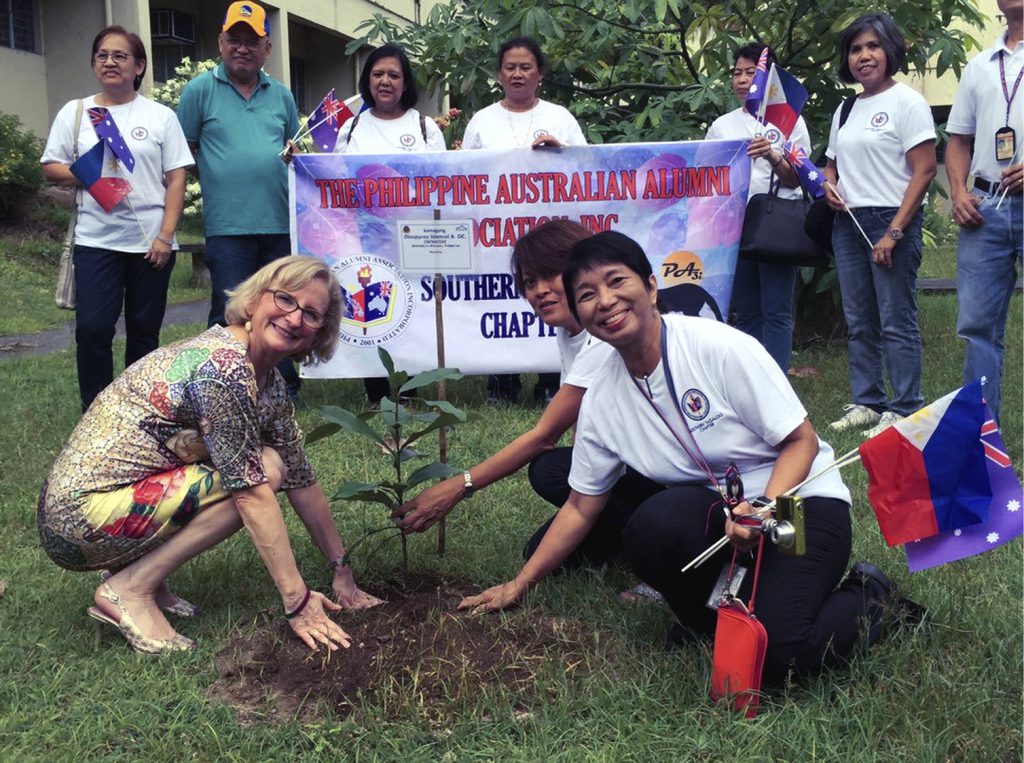 Ambassador to the Philippines Amanda Gorely planting a tree in the Australian Alumni Garden, University of the Philippines. [DFAT]