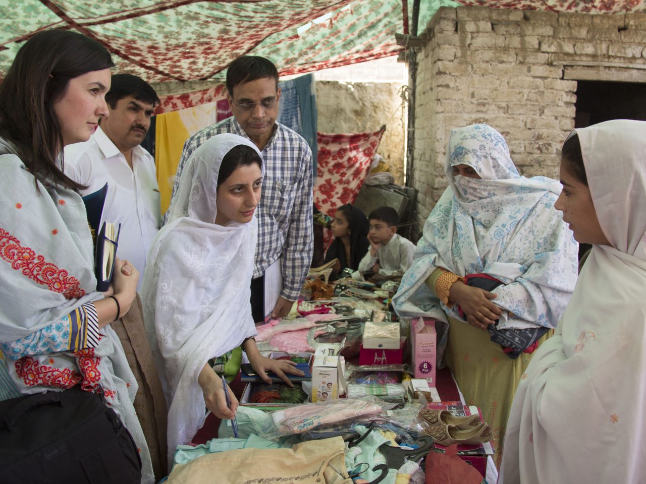 Australian High Commission staff in Pakistan meeting with a woman entrepreneur. [SRSP/Tauseef Ahmad]