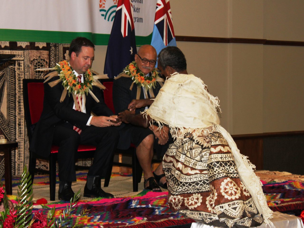 Former Minister for International Development and the Pacific Steven Ciobo signing the Seasonal Worker Programme MOU with the Fijian Minister for Employment, Productivity and Industrial Relations. [DFAT]