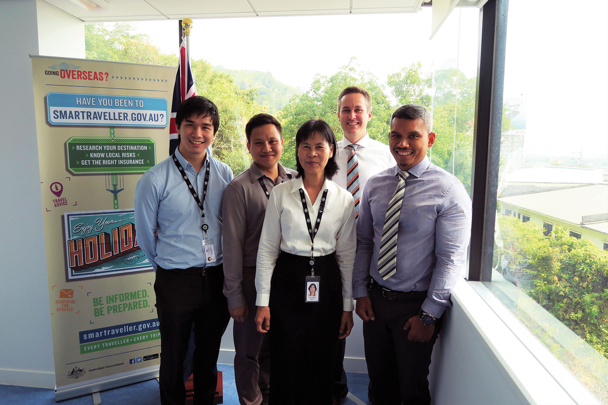 Consul-General Craig Ferguson (2nd right) and LES staff of the Consulate-General in Phuket, 8 April 2016. (L. to R.): Consular and Passport Officer Phee Chayakul, Driver Puti Suprungreang, Administrative Assistant Pensri Srikachorn, and Consular and Passport Manager Wootikrai Jitsmark. [DFAT/Phee Chayakul]