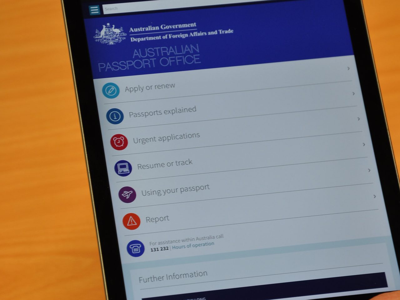 The new passport website appears on a mobile device. [DFAT/David Chadwick]