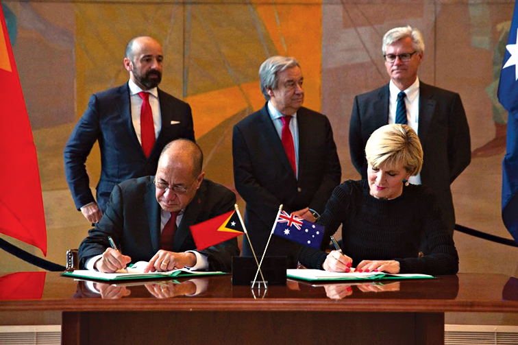 Minister for Foreign Affairs, Julie Bishop, and Minister in the Office of the Prime Minister for the Delimitation of Borders and the Agent in the Conciliation, Hermenegildo Pereira, signing the Maritime Boundary Treaty in New York