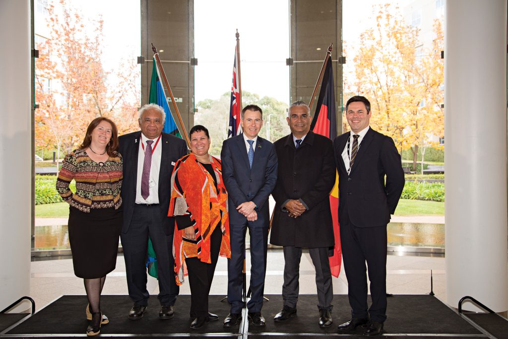 Professor Narelle Bedford, Professor Tom Calma, Robyn Forester, Deputy Secretary Richard Maude, Dr Stephen Hagen and Assistant Secretary Damien Miller celebrating National Reconciliation Week