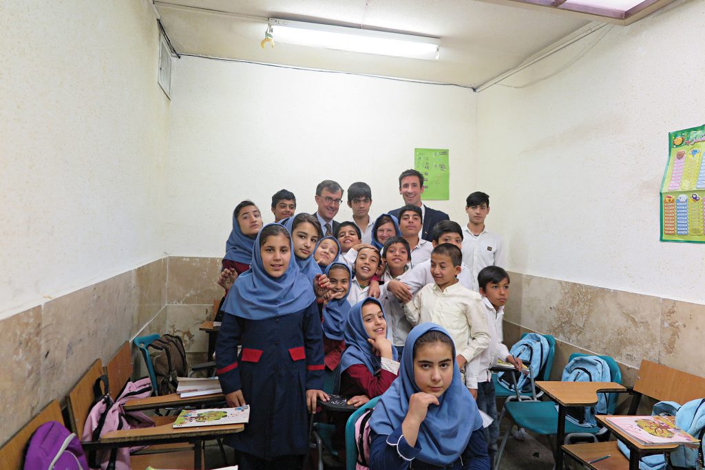 Young refugees welcome Australian embassy staff at the Society for the Protection of Working and Street Children, Karaj, Tehran