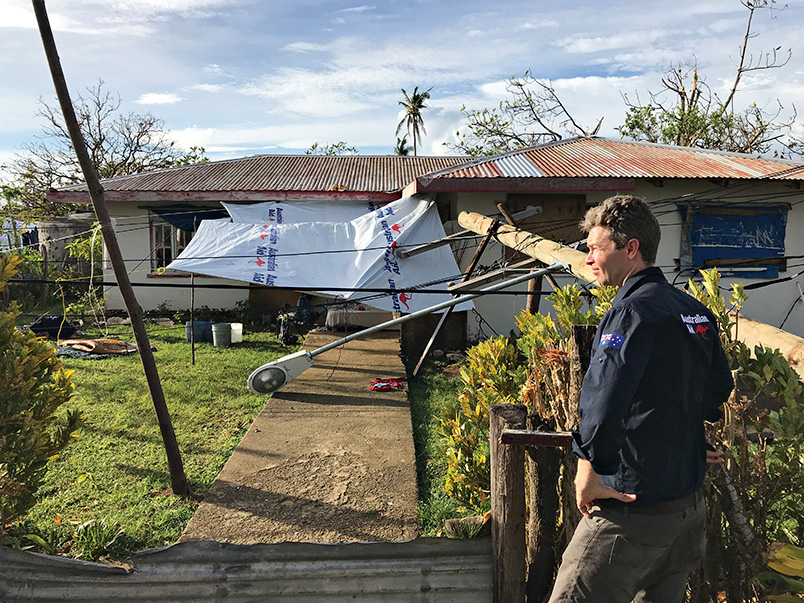 Crisis Response Team officer, Dave Kelly, surveys the damage following Cyclone Gita, which devastated Tonga in February