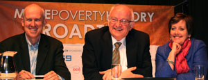 Photo of smiling panellists Mark Purcell, Bob McMullan and Ursula Stephens