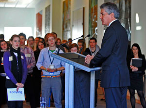 Photo of Stephen Smith addressing a large group of young people