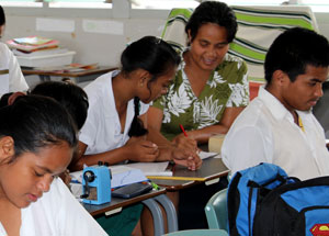 English teacher Mrs Tom working with a Year 12 student at Nauru Secondary School