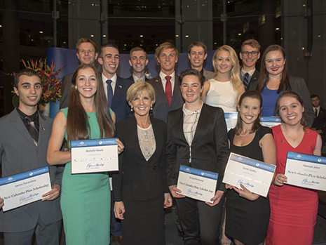 Scholars group photo with Julie Bishop, scholars holding up certificates