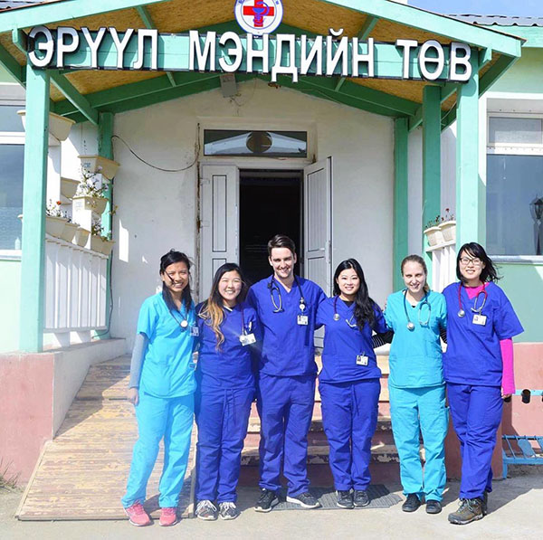 6 medical practitioner's standing out the front of a hospital in Mongolia. 