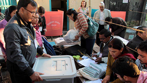 Officials preparing to open polling booth.