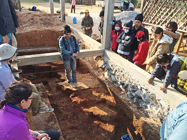 NCP Mobility Students and Laotian students on the dig site learn from each other. (Photo Credit: Nigel Chang)