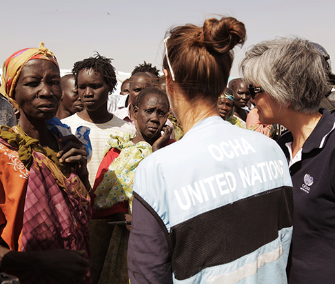 OCHA United Nations representatives with group of people