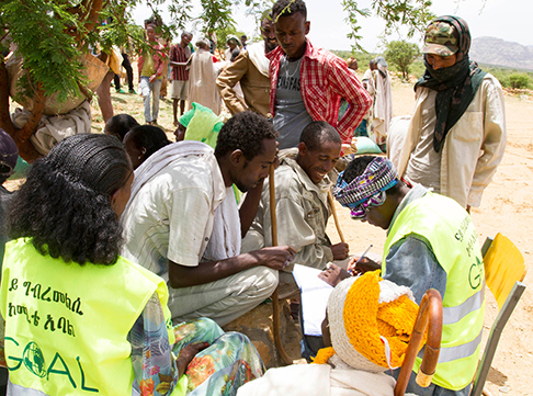 OCHA representatives taking details of civilians