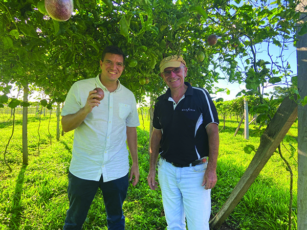 First Secretary Port Vila, Frédéric Jeanjean (left) visits Mr Robert Osbourne’s (right) passionfruit farm on the island of Espiritu Santo
