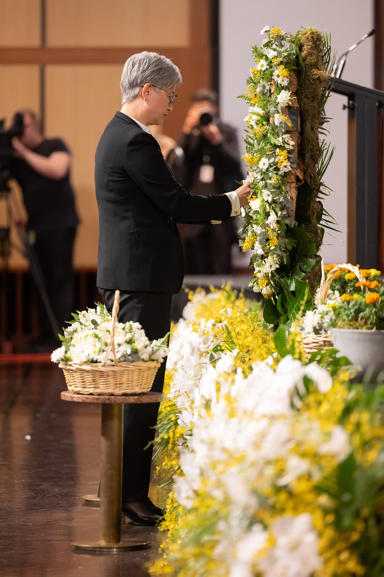 Senator the Hon Penny Wong laying a wreath to mark the 20th anniversary of the 2002 Bali bombings in Canberra.