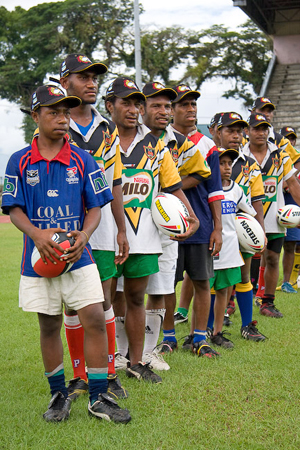 local players lined up at training session