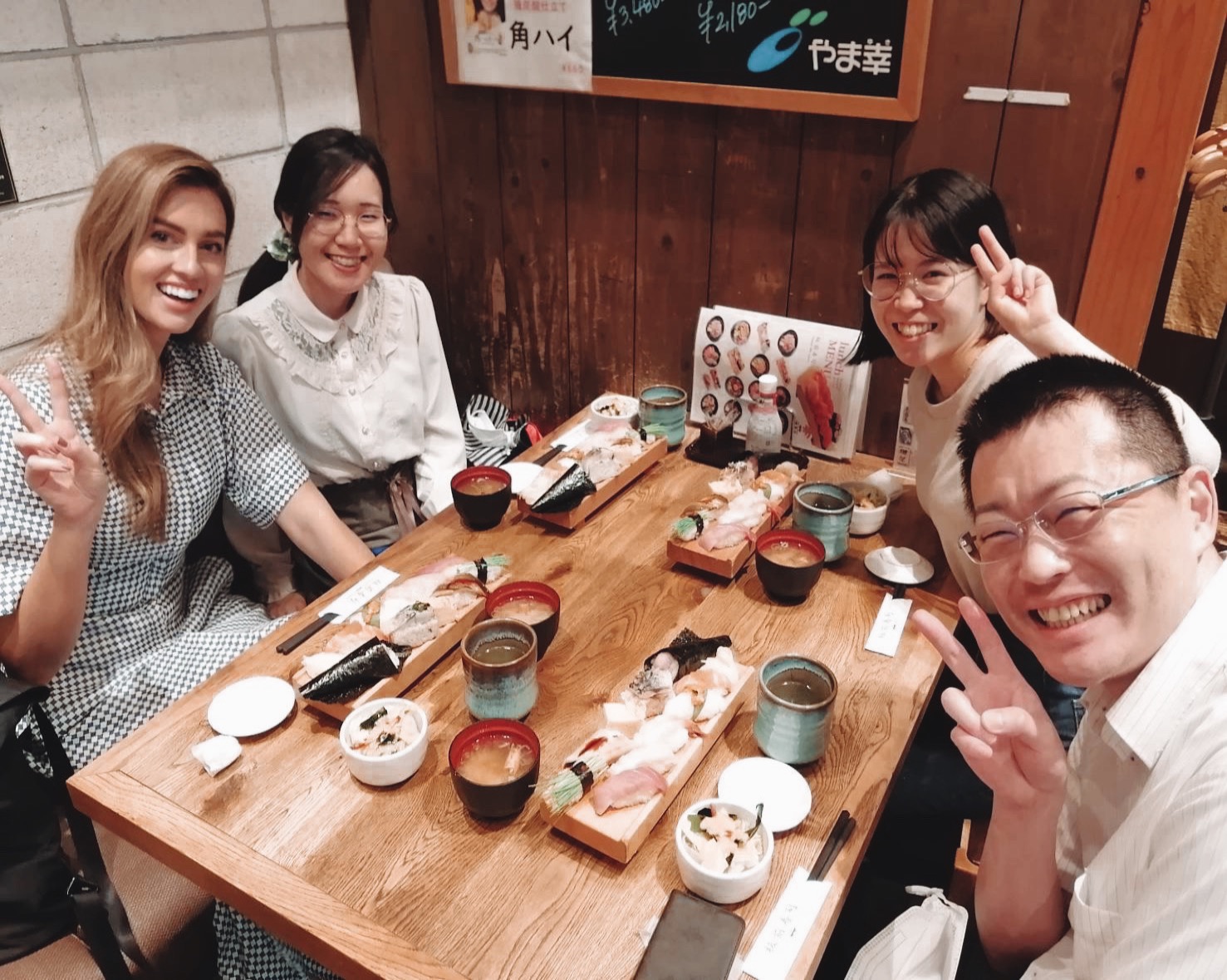 Alexandra Pozzo enjoying a traditional Japanese meal with fellow students and teachers