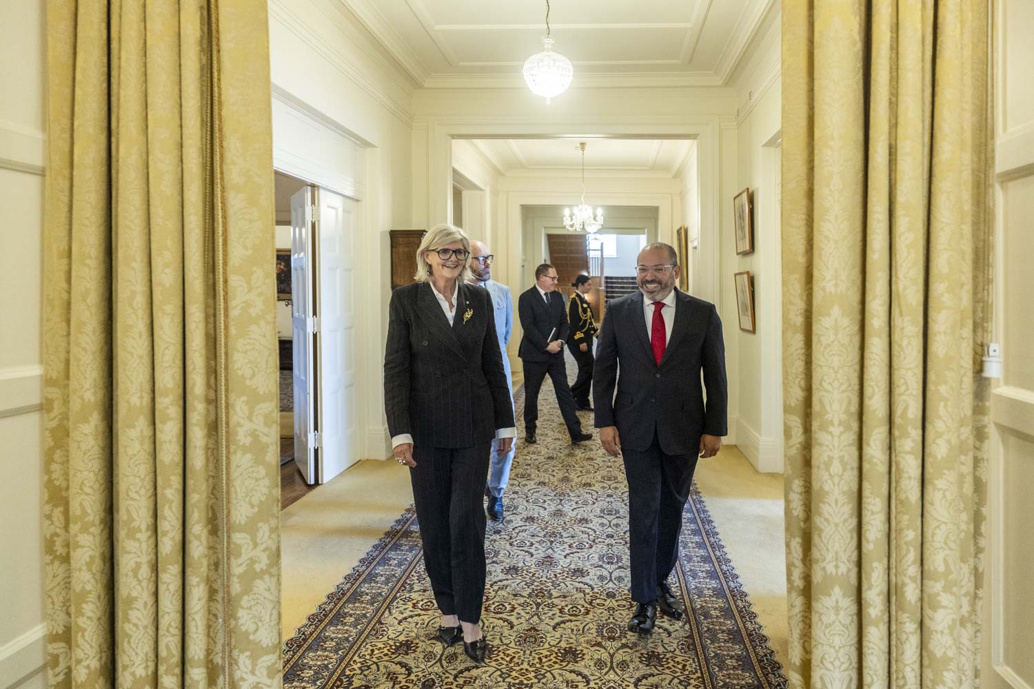 Image of His Excellency Mr Edward Aníbal PÉREZ REYES, Ambassador of the Dominican Republic walking the hallways and in conversation with the Governor-General of Australia Ms Sam Mostyn AC.