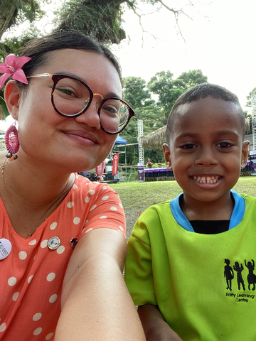 Rachel Spackman and a Mobile Kindy student at the Blue Pacific Village Event for the 51st Pacific Island Leaders Forum Meeting (Photo credit: Rachel Spackman)