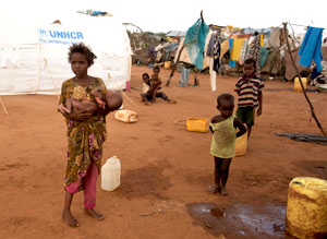 A young girl with her siblings in the Ifo refugee camp in Dadaab