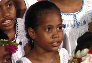 close up of Kiribati girl in a choir