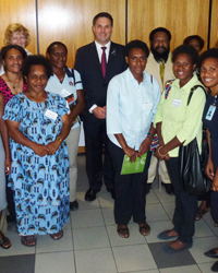 Photo of Richard Marles speaking to a gathering of women leaders at an International Women's Day Breakfast in Papua New Guinea