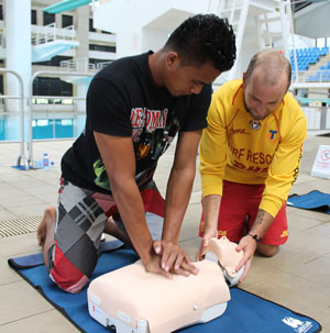 Australian volunteer showing resuscitation techniques