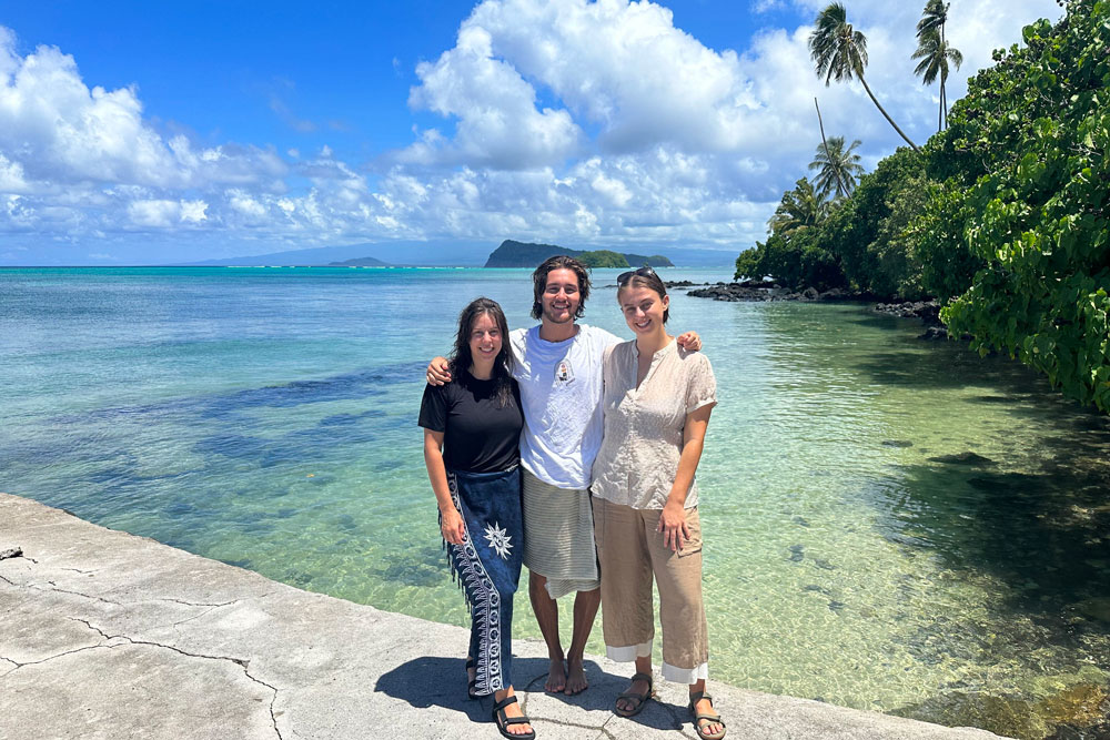 Shannon Schulz and two friends on a beach in Samoa. 