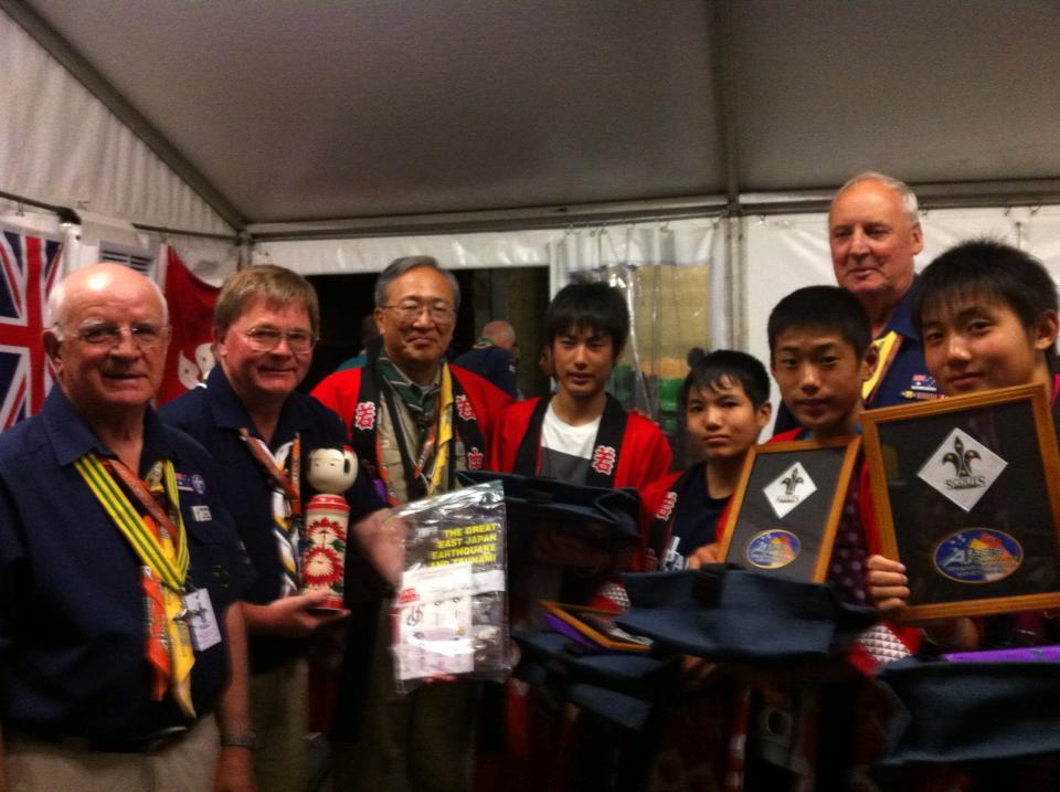 Scouts holding up awards