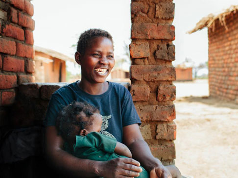 Woman holding a baby