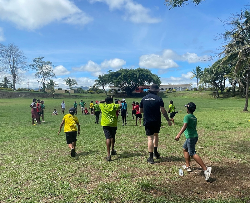 Kids gathering on a sports field