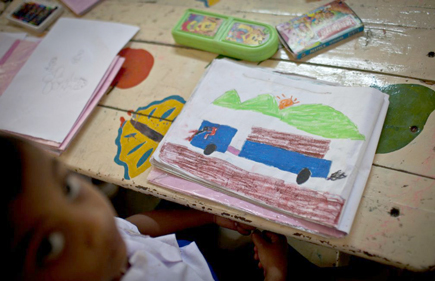 Student drawing pictures
